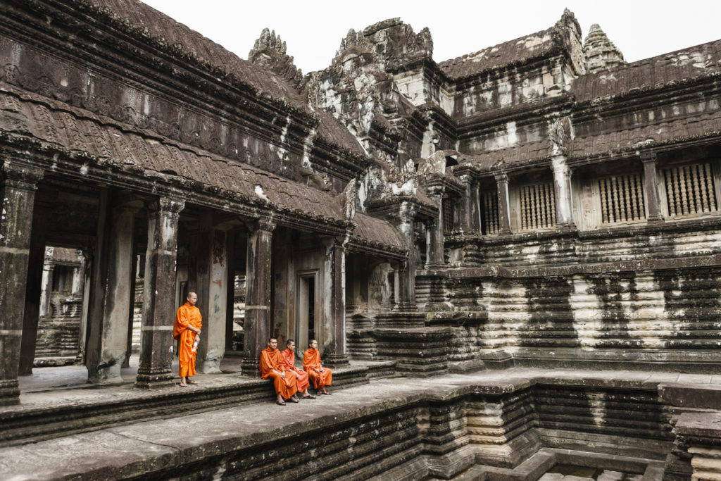 Monks at rest in Angkor Wat